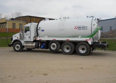 White tank truck with a Fruitland pump